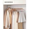 imageSONGMICS 20Pack Pants Hangers 167Inch Long Velvet Hangers with Adjustable Clips HeavyDuty NonSlip Skirt Hangers SpaceSaving for Pants Skirts Coats Dresses Black UCRF012B20Pale Brown