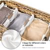 imageSONGMICS Laundry Hamper with Lid 140L Synthetic Rattan Laundry Basket with Wheels Clothes Hamper with 3 Removable Liner Bags 3Section Hampers with Handles Laundry Room Natural ULCB083N01Natural