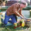 imageSONGMICS Garden Kneeler and Seat Multifunctional Garden Kneeling Bench Gardening Gifts for Women Men Folding Gardening Stool with 1 Tool Bag 6Inch Wide Kneeling Pad Dark Green UGGK49LGreen