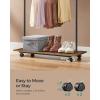 imageSONGMICS Clothes Rack with Wheels Clothing Rack for Hanging Clothes 388 Inches Metal Garment Rack with Shelf Loads up to 110 lb for Bedroom Closet Rustic Brown and Ink Black UHSR151B01Black