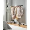 imageSONGMICS Clothes Rack with Wheels HeavyDuty Garment Rack with Extendable Hanging Rod 243 lb Load Capacity 177 x 63787 x 641 Inches ChromePlated Silver UHSR176E01Matte Black