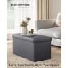 imageSONGMICS MAZIE Collection  43 Inches Folding Storage Ottoman Bench Ottoman with Storage Foot Rest Stool Load 660 lb for Living Room Synthetic Leather White ULSF702Dark Gray