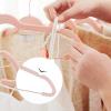 imageSONGMICS 24Pack Velvet Pants Hangers 167Inch Long Coat Hangers with Rose Gold Colored Movable Clips HeavyDuty NonSlip SpaceSaving for Pants Skirts Dresses White UCRF014W01Light Pink