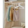 imageSONGMICS Clothes Hangers Pack of 50 Plastic Hangers with Wide Shoulder Notches SpaceSaving Coat Hangers 164 Inches Wide for Closet Cloud White UCRP010W01Cloud White