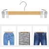 imageSONGMICS Wooden Pants Hangers 12 Pack Pants Hangers with Clips Adjustable AntiRust Metal Clips 360 Swivel Hook Skirt Hangers for Pant Skirts Natural Grain UCRW00812With Clips