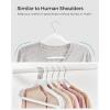 imageSONGMICS RubberCoated Plastic Hangers 50 Pack NonSlip Coat Hangers SpaceSaving Slim Clothes Hangers 360 Degree Swivel Hooks Shoulder Notches White UCRP008W05White