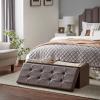 imageSONGMICS MAZIE Collection  15 Inches Ottoman with Storage Footstool Storage Ottoman with Metal Grommet Handles Load 660 lb for Dorm Living Room Bedroom Synthetic Leather Black ULSF30BBrown